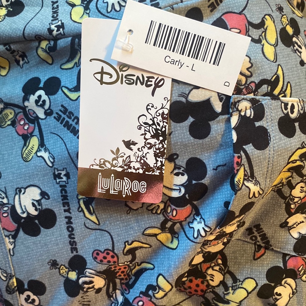 Lularoe Disney  Carly dress NWT Mickey Mouse and Minnie mouse dress with pocket